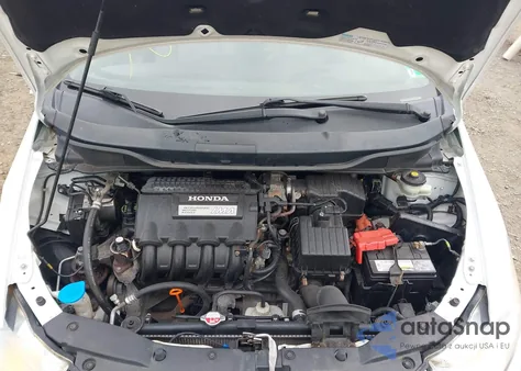 2012 Honda Insight z USA, uszkodzony, nr VIN JHMZE2H3XCS000193